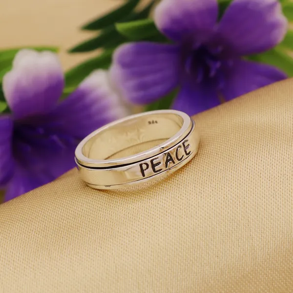 Handcrafted_925_Silver_Peace_Band_spinner_Ring_-_Simple_Polished_Message_Jewelry