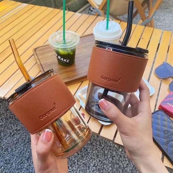 Glass_Reusable_Sipper_Bottle_With_Leather_Sleeve
