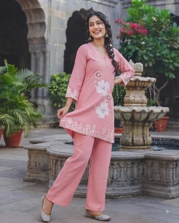 Women_Pink_Pure_Cotton_Solid_Straight_Kurta_with_Payjama_&_Detailed_Floral_Embroidery_Set
