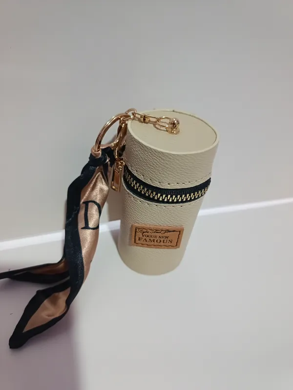 Cream_Cylindrical_Zipper_Sling_Bag_with_Scarf