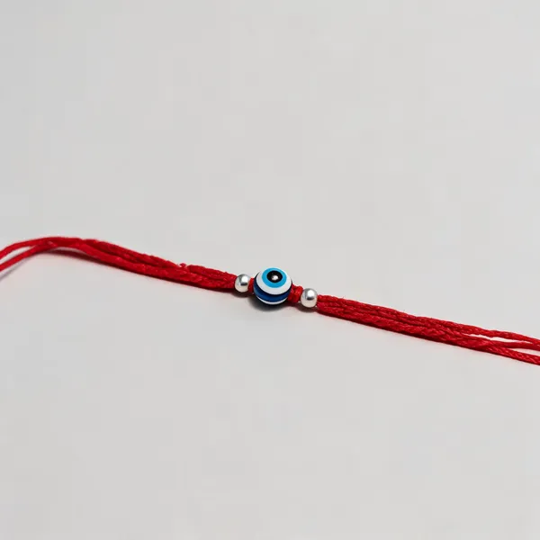 Red_Thread_Blue_Bead_925_Silver_Rakhi_For_Men