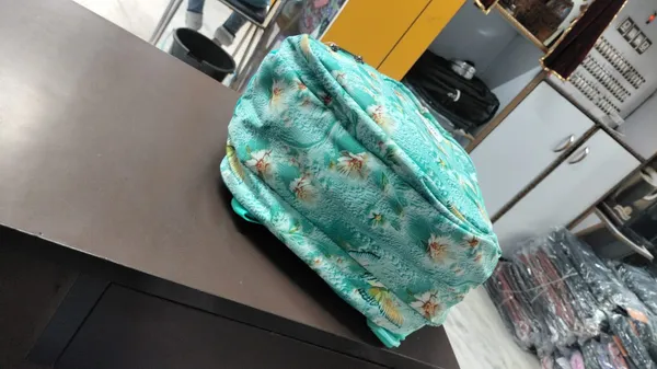 Slope_Turquoise_Floral_Print_Backpack
