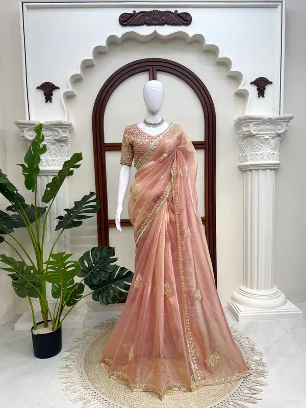 Fall_in_love_with_this_stunning_saree_in_an_eye-catching_shade,_crafted_with_finesse_and_rich_detailing._A_perfect_blend_of_grace_and_glam!