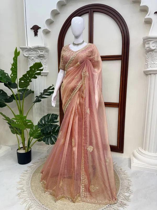 Fall_in_love_with_this_stunning_saree_in_an_eye-catching_shade,_crafted_with_finesse_and_rich_detailing._A_perfect_blend_of_grace_and_glam!