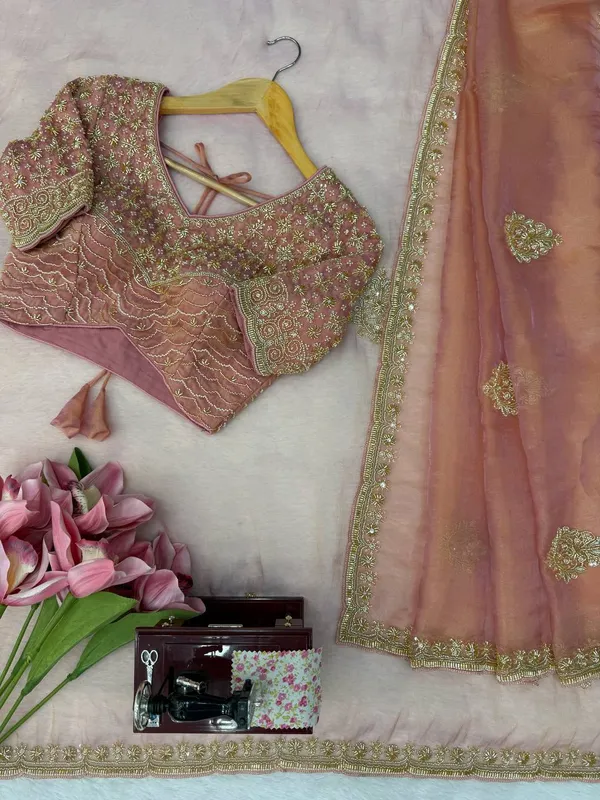 Fall_in_love_with_this_stunning_saree_in_an_eye-catching_shade,_crafted_with_finesse_and_rich_detailing._A_perfect_blend_of_grace_and_glam!