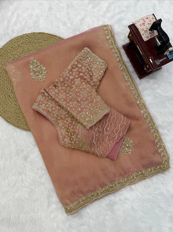 Fall_in_love_with_this_stunning_saree_in_an_eye-catching_shade,_crafted_with_finesse_and_rich_detailing._A_perfect_blend_of_grace_and_glam!