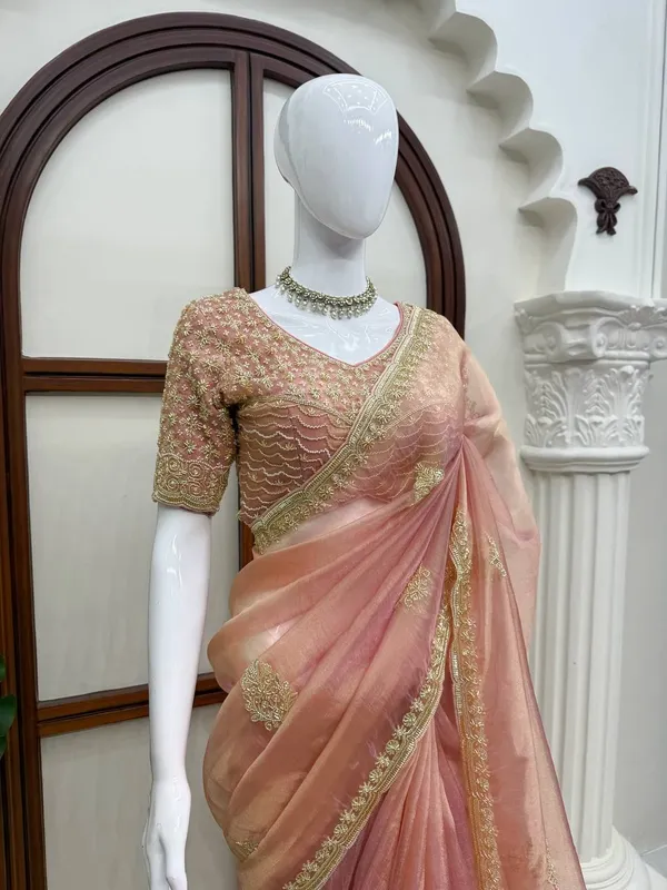 Fall_in_love_with_this_stunning_saree_in_an_eye-catching_shade,_crafted_with_finesse_and_rich_detailing._A_perfect_blend_of_grace_and_glam!