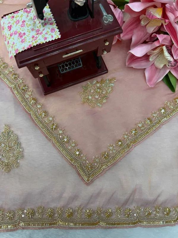 Fall_in_love_with_this_stunning_saree_in_an_eye-catching_shade,_crafted_with_finesse_and_rich_detailing._A_perfect_blend_of_grace_and_glam!