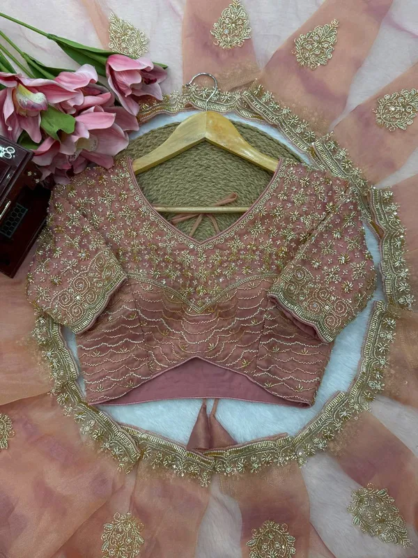 Fall_in_love_with_this_stunning_saree_in_an_eye-catching_shade,_crafted_with_finesse_and_rich_detailing._A_perfect_blend_of_grace_and_glam!