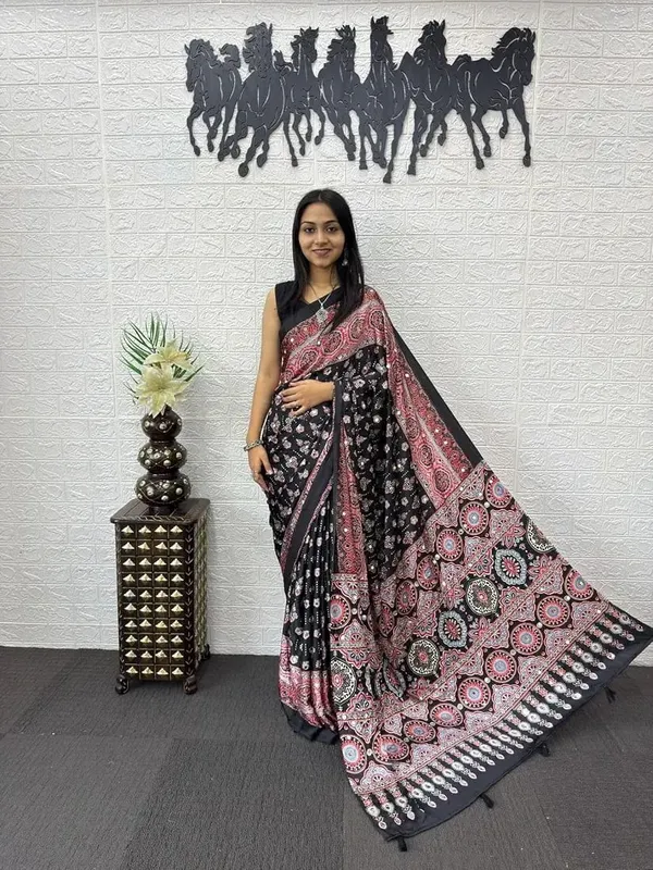 New_Launching_Designer_Ajarakh_Print_Along_With_Real_Mirror_Work_Along_With_Fancy_Printed_Blouse_With_Piping_And_Heavy_Latkans_Saree
