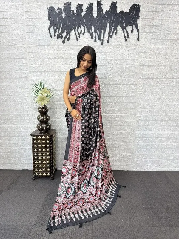 New_Launching_Designer_Ajarakh_Print_Along_With_Real_Mirror_Work_Along_With_Fancy_Printed_Blouse_With_Piping_And_Heavy_Latkans_Saree