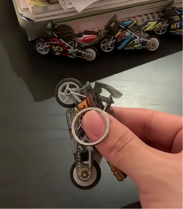 Mini_Sparking_Bike_Toy_Keychain_Pull_Back_Pop_Wheelies_Ignite_The_Fun_Default_Title