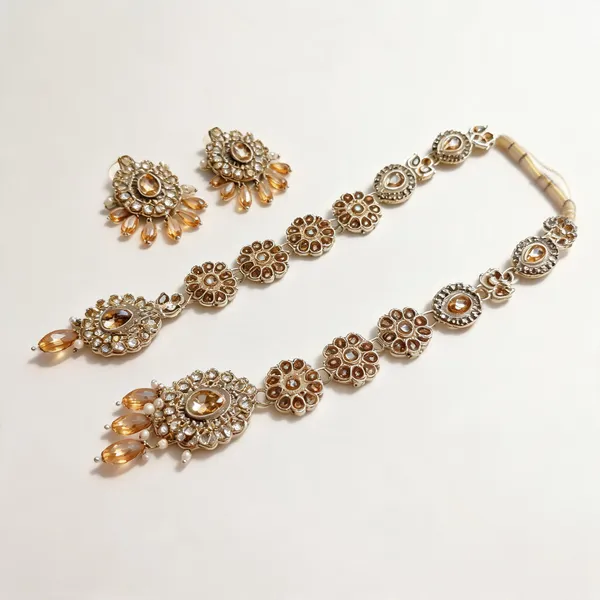 Golden_Metal_Floral_Stone_Bridal_Necklace_Earring_Set_For_Women