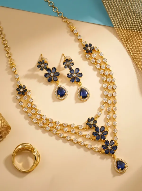 Sapphire_Blue_CZ_Bridal_Necklace_Set_|_Gold-Plated_Triple-Strand_Haar_with_Matching_Earrings