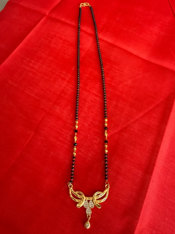 Gold_Tone_Black_Beaded_Peacock_Pendant_Mangalsutra_For_Women