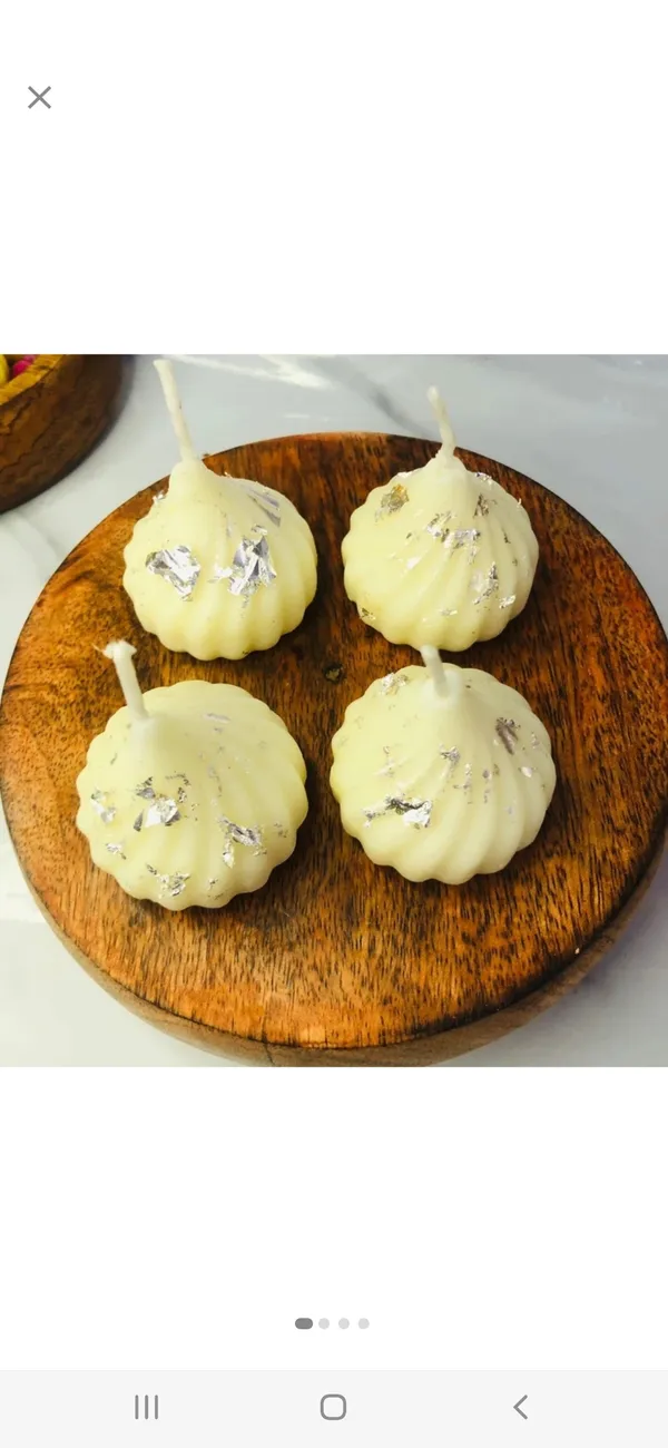 Wax_Decorative_white_modak_candle__Silver_Flakes_Candles
