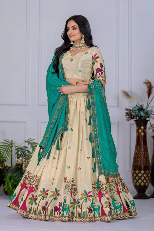 Cream_And_Teal_Heavy_Lichi_Fabric_And_Jacquard_Silk_Patola_Print_Lehenga_Ch