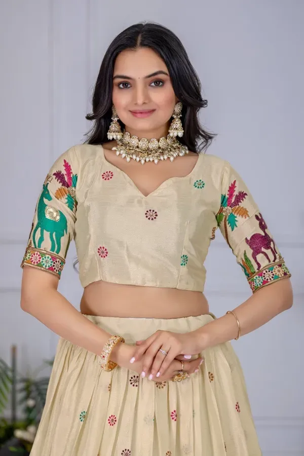 Cream_And_Teal_Heavy_Lichi_Fabric_And_Jacquard_Silk_Patola_Print_Lehenga_Ch