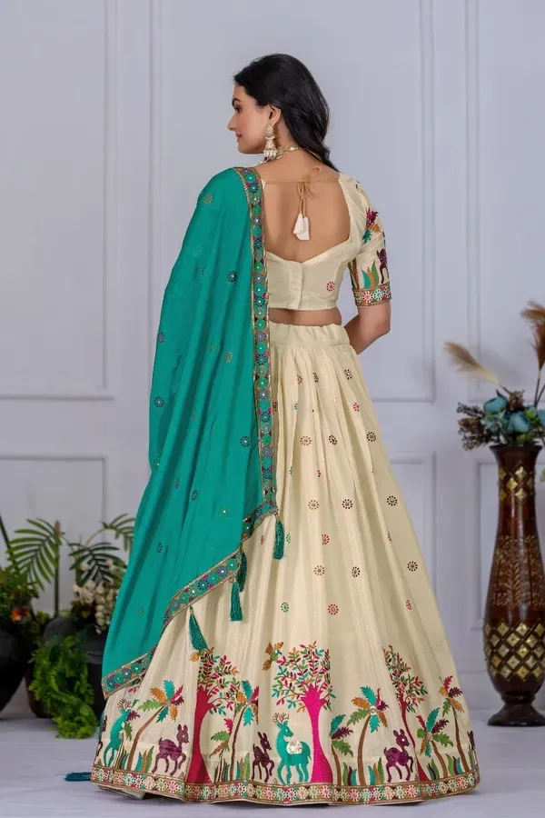 Cream_And_Teal_Heavy_Lichi_Fabric_And_Jacquard_Silk_Patola_Print_Lehenga_Ch