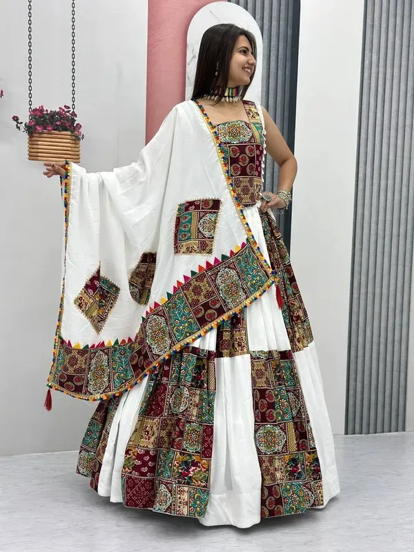 White_Heavy_Lichi_Fabric_And_Jacquard_Silk_Patola_Print_Lehenga_Choli_For_W_More