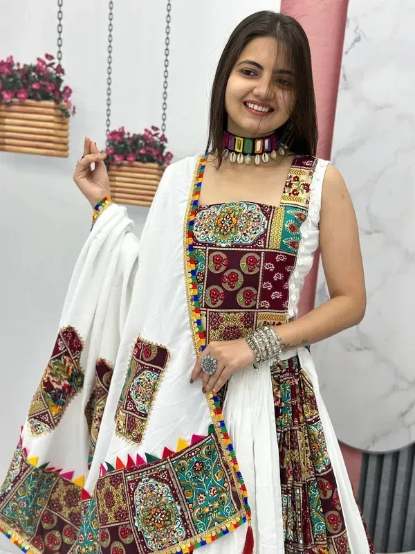 White_Heavy_Lichi_Fabric_And_Jacquard_Silk_Patola_Print_Lehenga_Choli_For_W_More