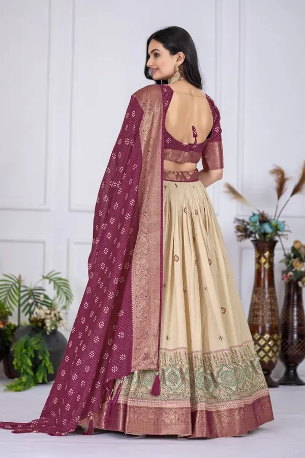 Cream_And_Purple_Heavy_Lichi_Fabric_And_Jacquard_Silk_Patola_Print_Lehenga_More
