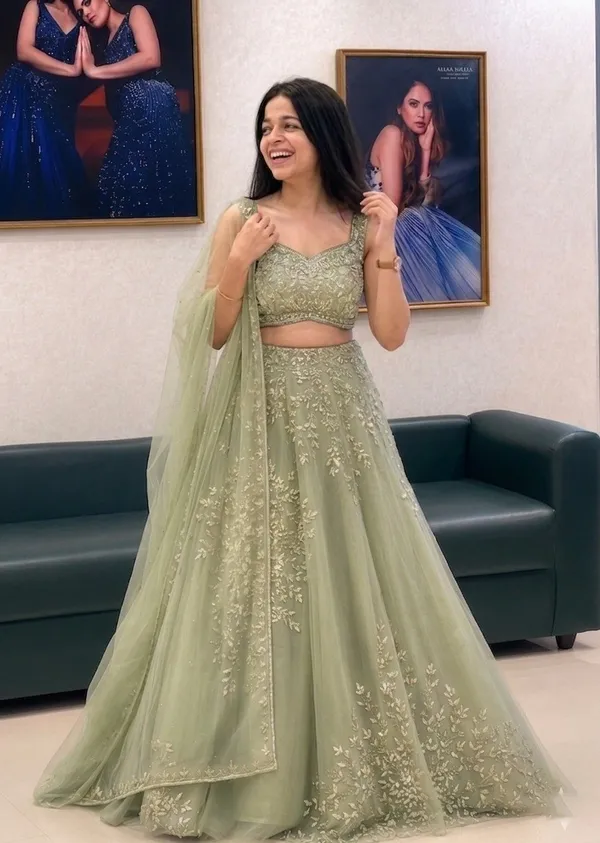 Sage_Green_Net_Sleeveless_Floral_Embroidered_Lehenga_Choli_For_Women