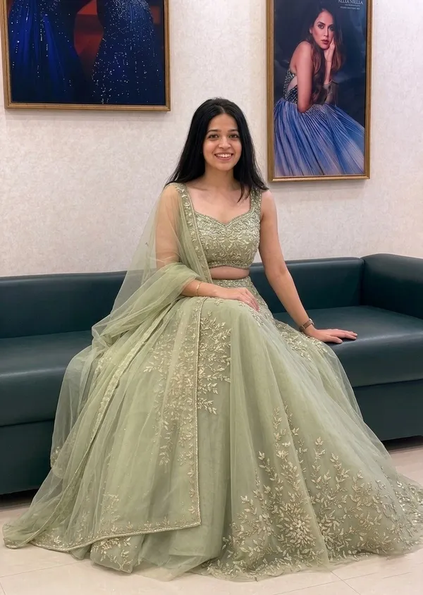 Sage_Green_Net_Sleeveless_Floral_Embroidered_Lehenga_Choli_For_Women