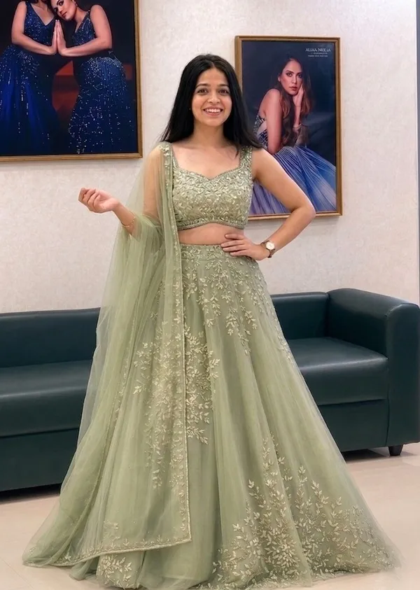 Sage_Green_Net_Sleeveless_Floral_Embroidered_Lehenga_Choli_For_Women