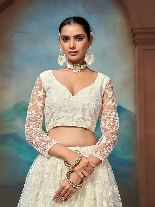 Ivory_Net_Full_Sleeve_Floral_Embroidered_Lehenga_Choli_Set_For_Women