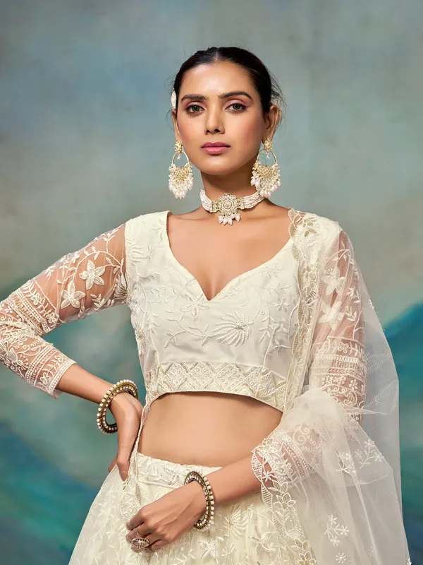 Ivory_Net_Full_Sleeve_Floral_Embroidered_Lehenga_Choli_Set_For_Women