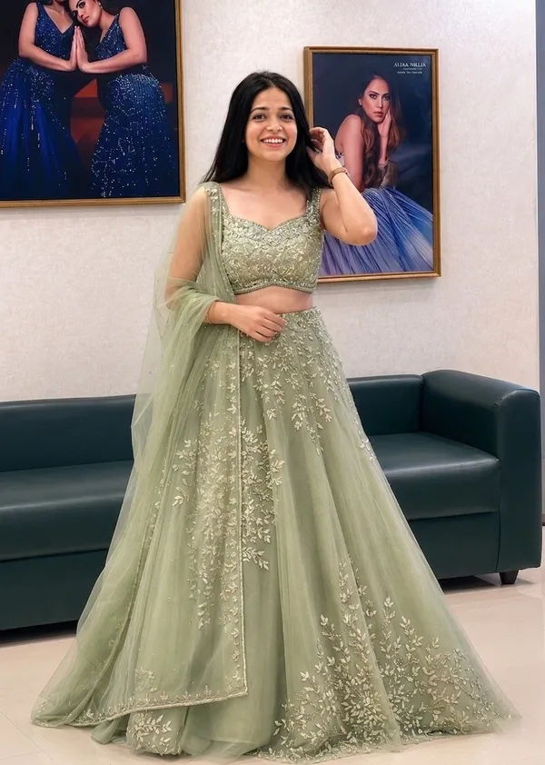 Sage_Green_Net_Sleeveless_Floral_Embroidered_Lehenga_Choli_For_Women