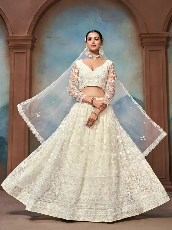 Ivory_Net_Full_Sleeve_Floral_Embroidered_Lehenga_Choli_Set_For_Women