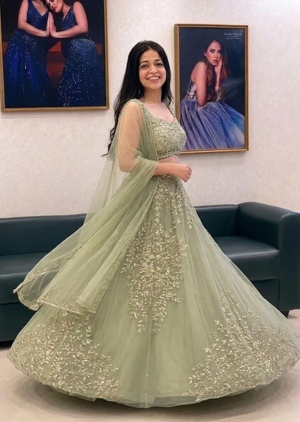 Sage_Green_Net_Sleeveless_Floral_Embroidered_Lehenga_Choli_For_Women