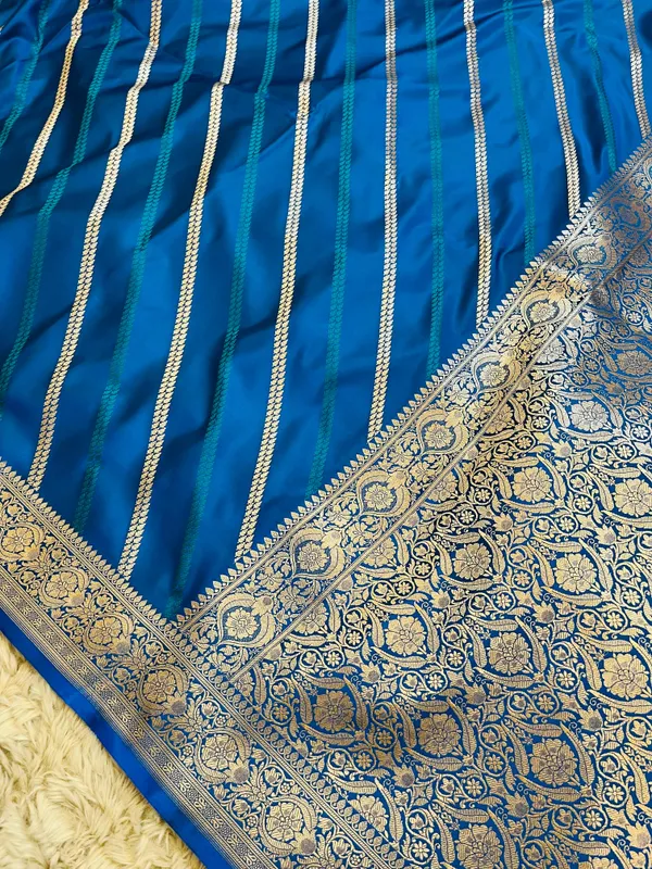 Sky_Blue_Mashru_Katan_Silk_Diagonal_Zari_Stripes_Floral_Border_Saree_For_Women