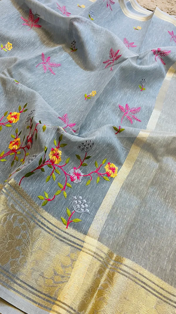 Grey_Banarasi_Linen_Cotton_Saree_with_Floral_Embroidery_&_Rich_Antique_Gold_Zari_Border