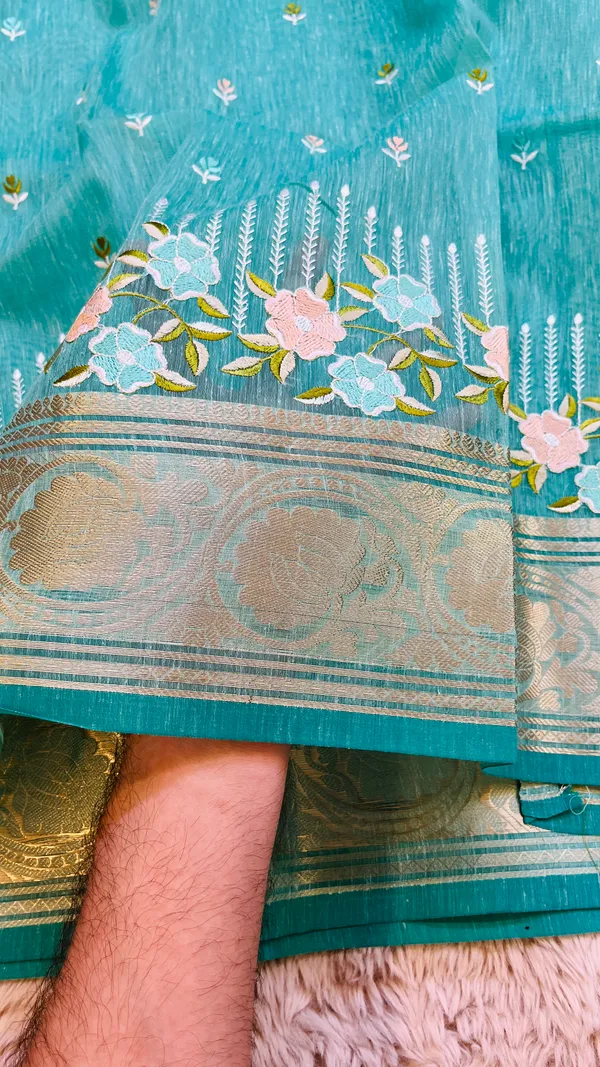 Sea_Green_Banarasi_Linen_Cotton_Saree_with_Floral_Embroidery_&_Rich_Antique_Gold_Zari_Border