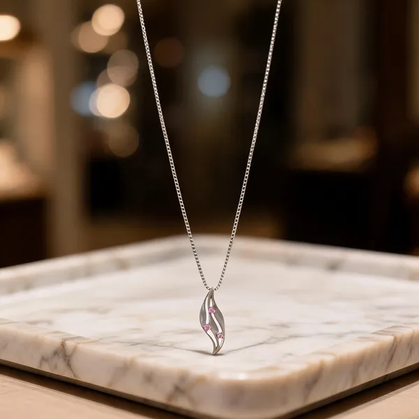 Curved_Wave_Pendant_With_Pink_Gemstones