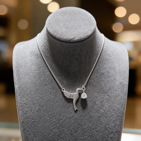Silver_Hummingbird_Pendant_With_Solitaire_Charm