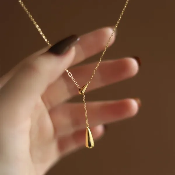 Nez__Pendant__gold_Stainless_steel
