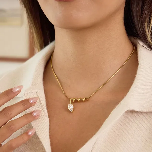 Twirl_Drop_Necklace__Necklace_gold_Stainless_steel