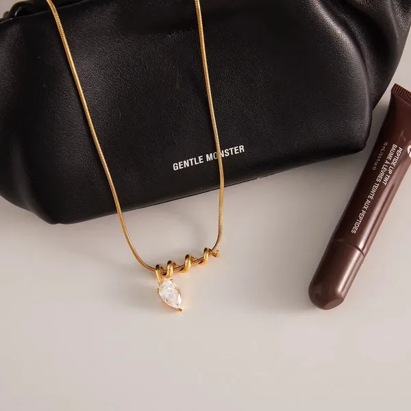 Twirl_Drop_Necklace__Necklace_gold_Stainless_steel