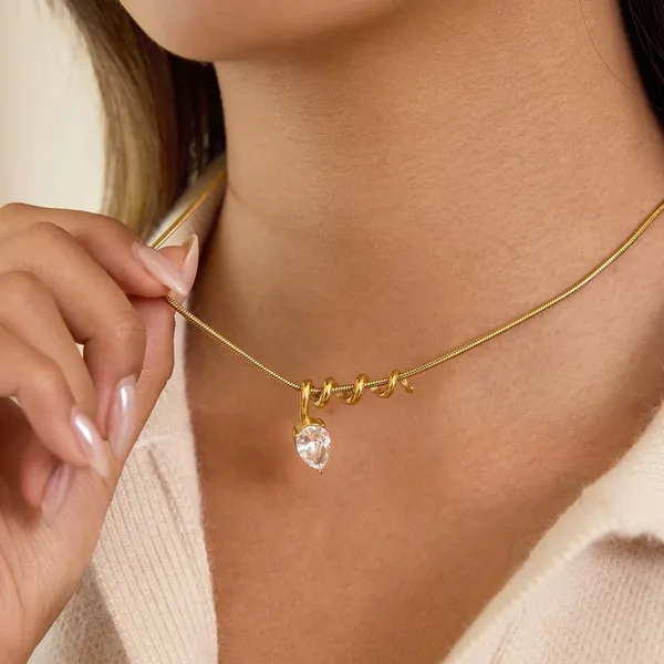 Twirl_Drop_Necklace__Necklace_gold_Stainless_steel