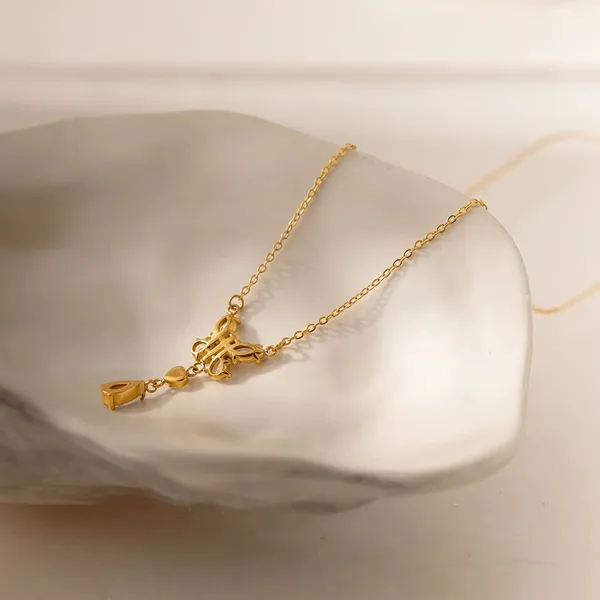 Mariposa_Drop_Pendant__Pendant__gold_Stainless_steel