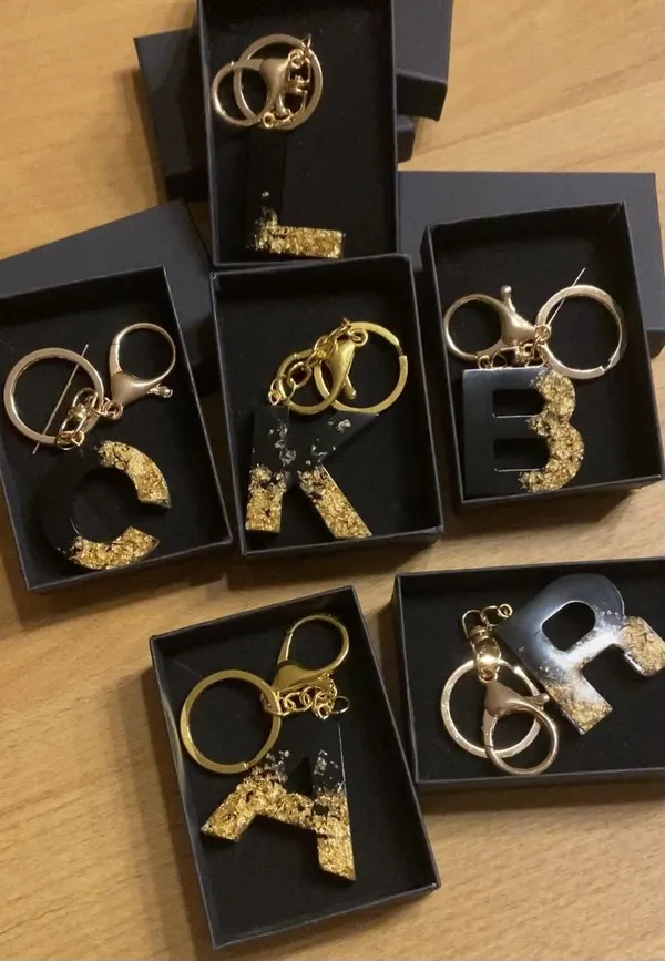 Black_And_Gold_Crochet_Yarn_Initial_Letter_Keychain_For_Gifting,_Bag_Accessories,_Accessories_Pack_Of_2