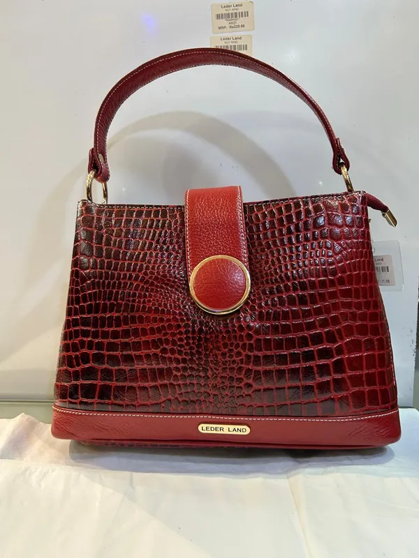 Burgundy_Embossed_Structured_Handbag_For_Women