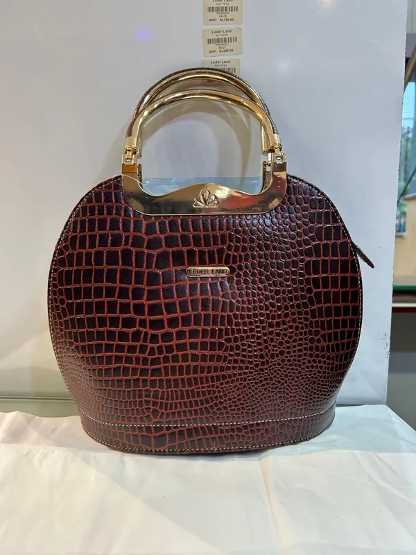 Burgundy_Textured_Structured_Handbag_For_Women