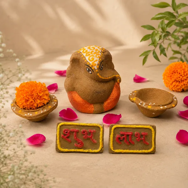 Traditional_Puja_Combo:_Gomay_Ganesh_Ji_4''_+_Cow_Dung_Diya_-_A_Set_Of_12_+_Sticker_Shubh_Labh