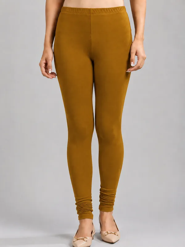 Brown_Premium_Cotton_And_Elastane_Churidar_For_Women