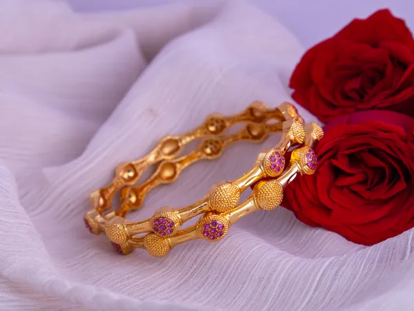 Gold_Metal_Purple_Stone_Studded_Round_Motif_Bangles_For_Women